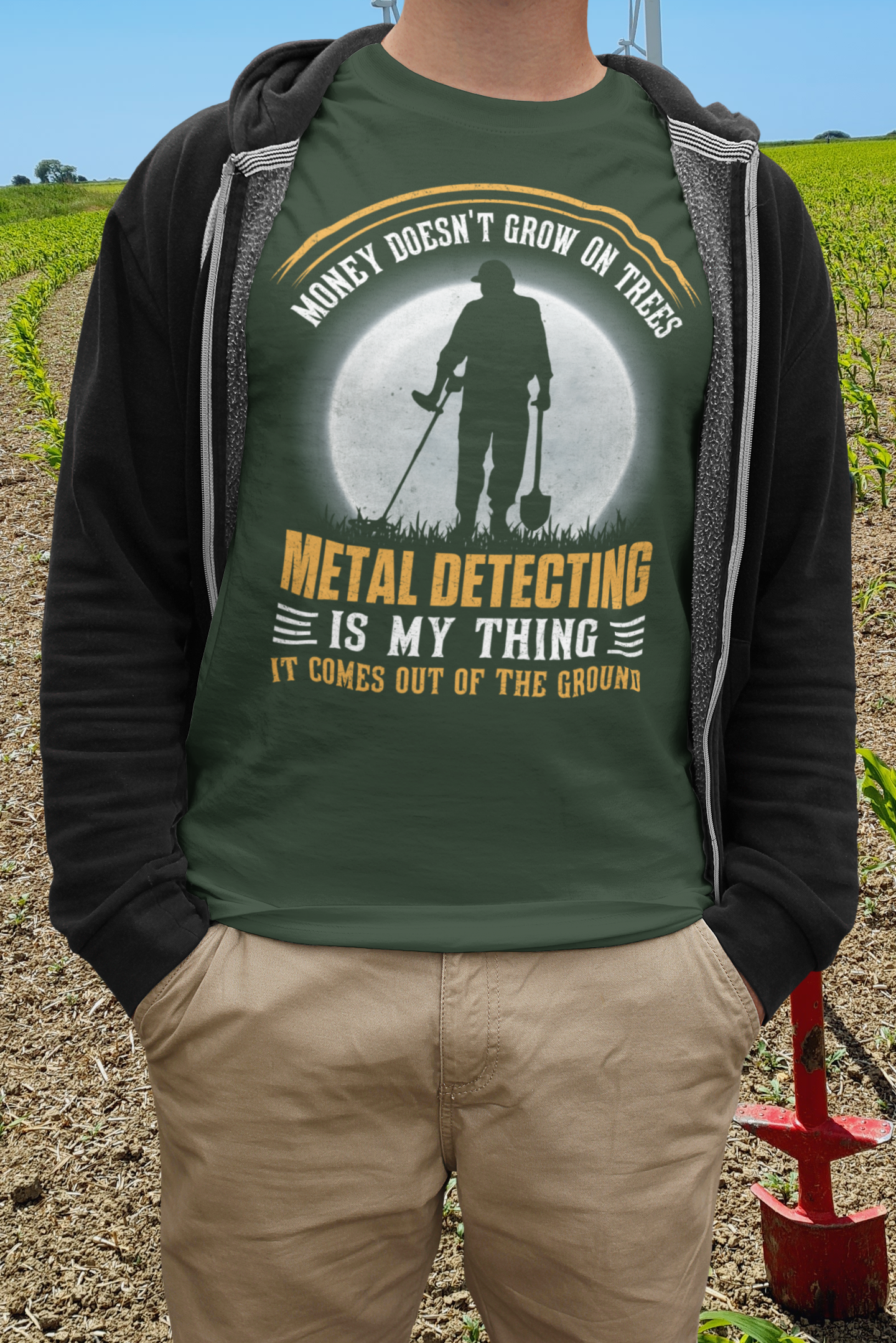 Money doesn't grow on trees, it comes out of the ground T-shirt