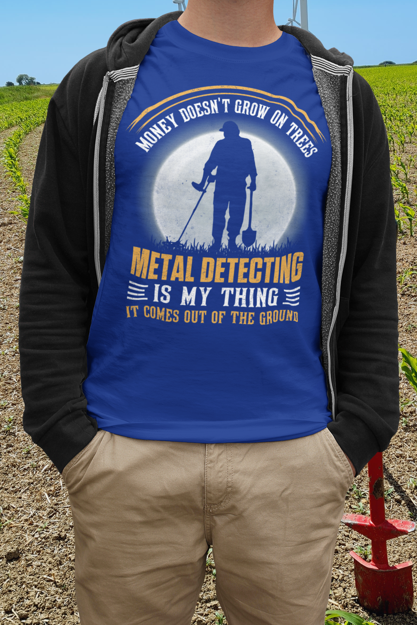 Money doesn't grow on trees, it comes out of the ground T-shirt