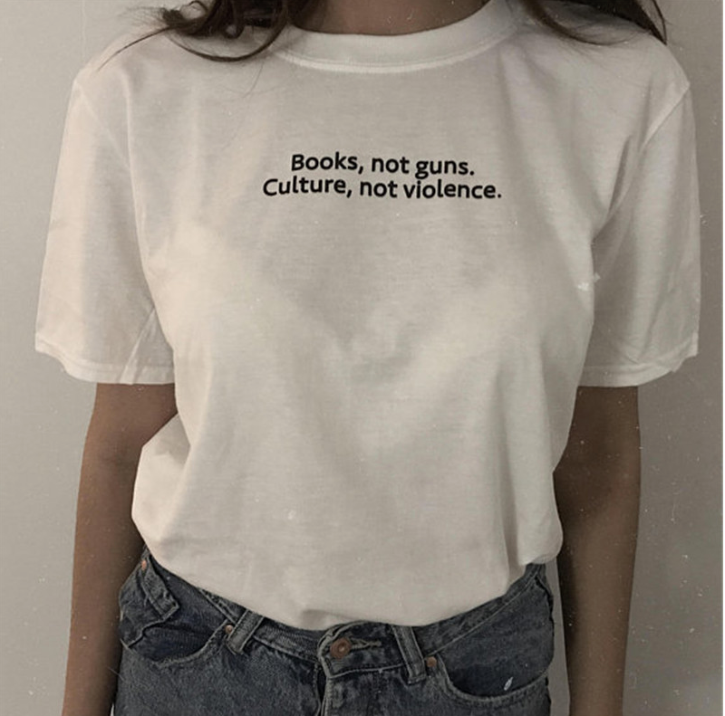 Books not guns.Culture not violence T-shirt - Urbantshirts.co.uk